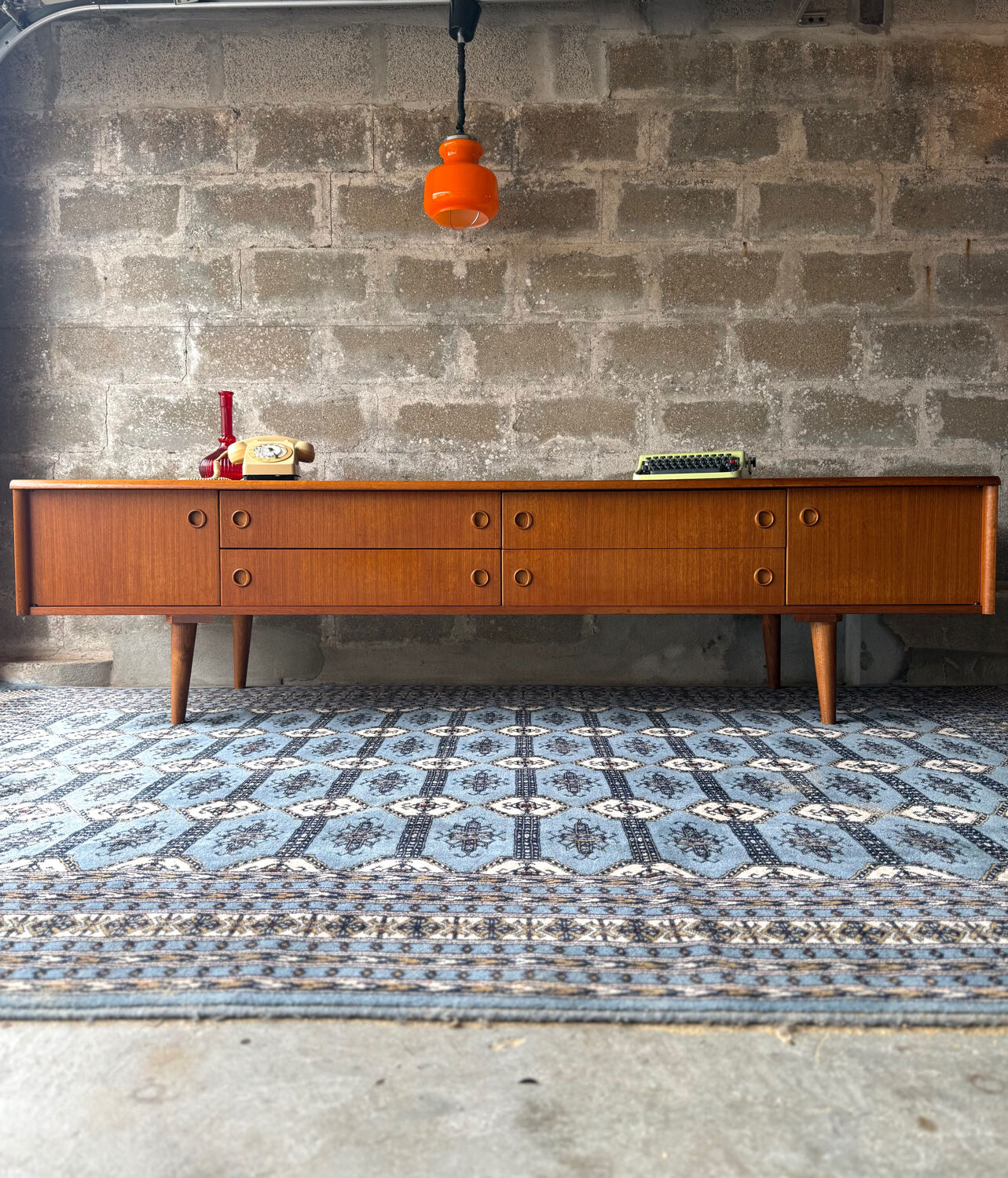 Scandinavian low sideboard in teak, 1970.