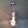 Suspension in the shape of a silver bulb.