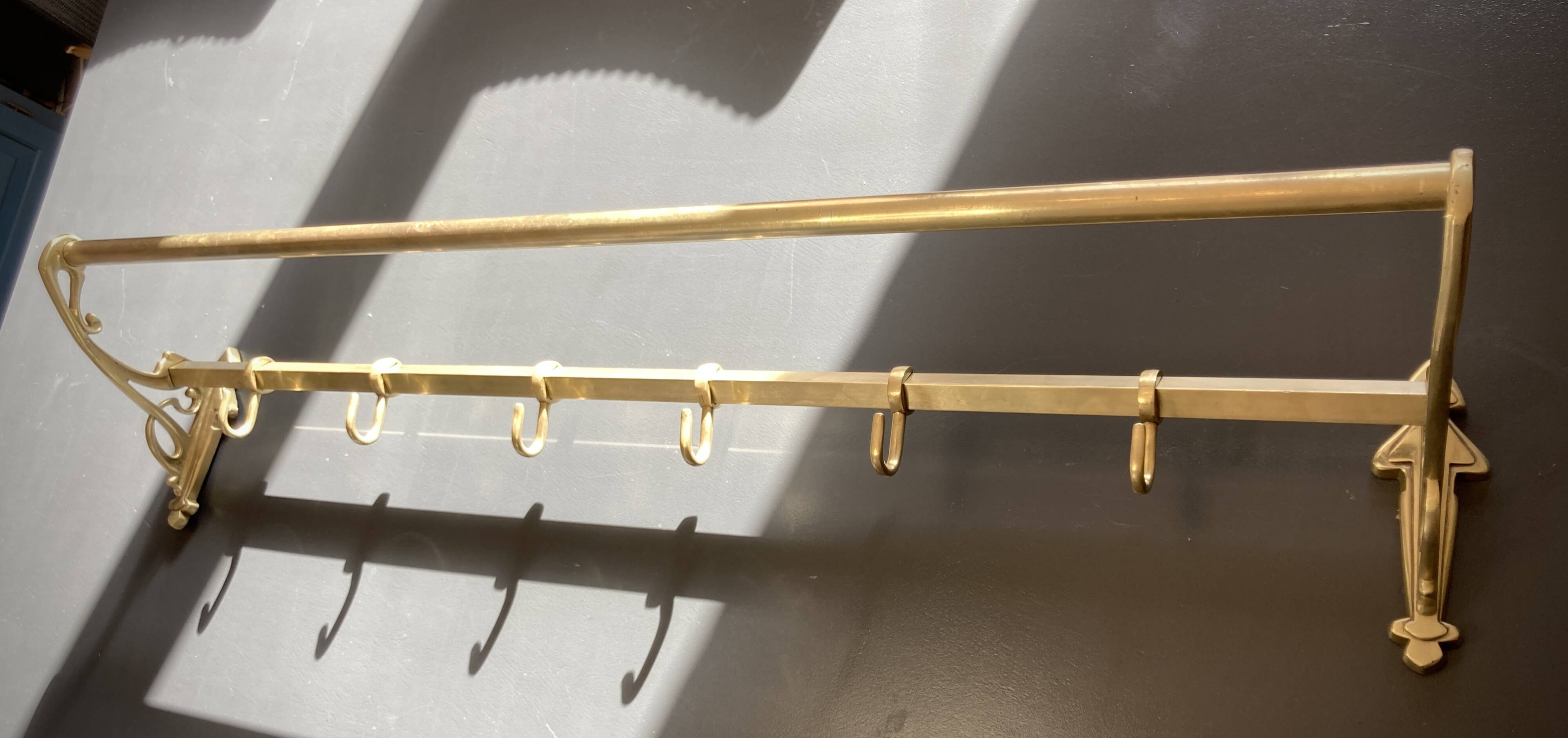 Art-deco wall-mounted coat rack in brass
