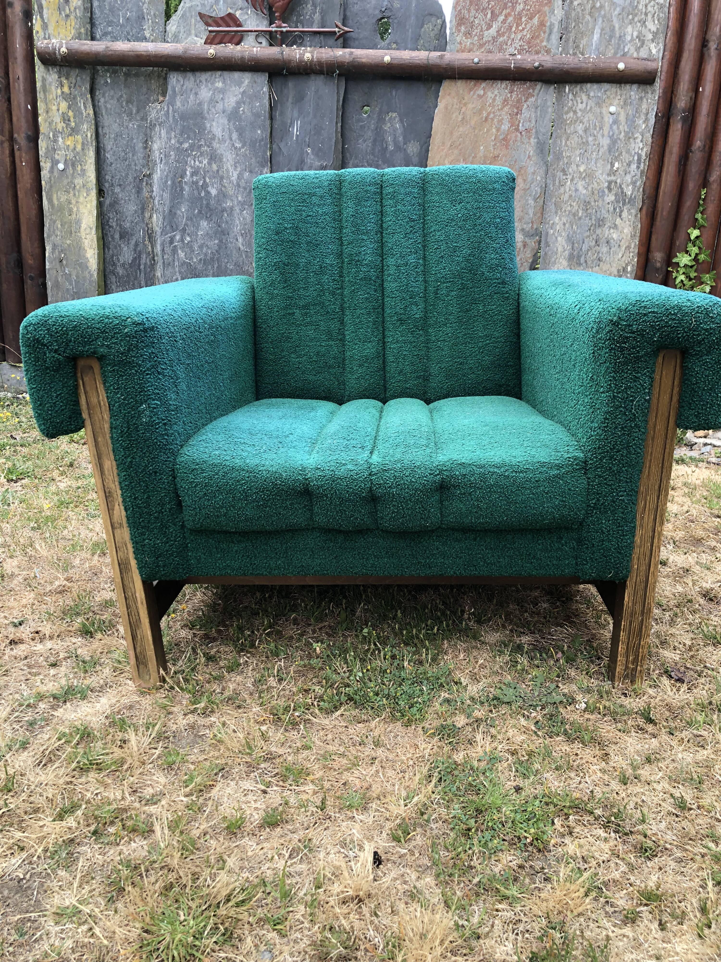 Duo of vintage armchairs with green fabrics.