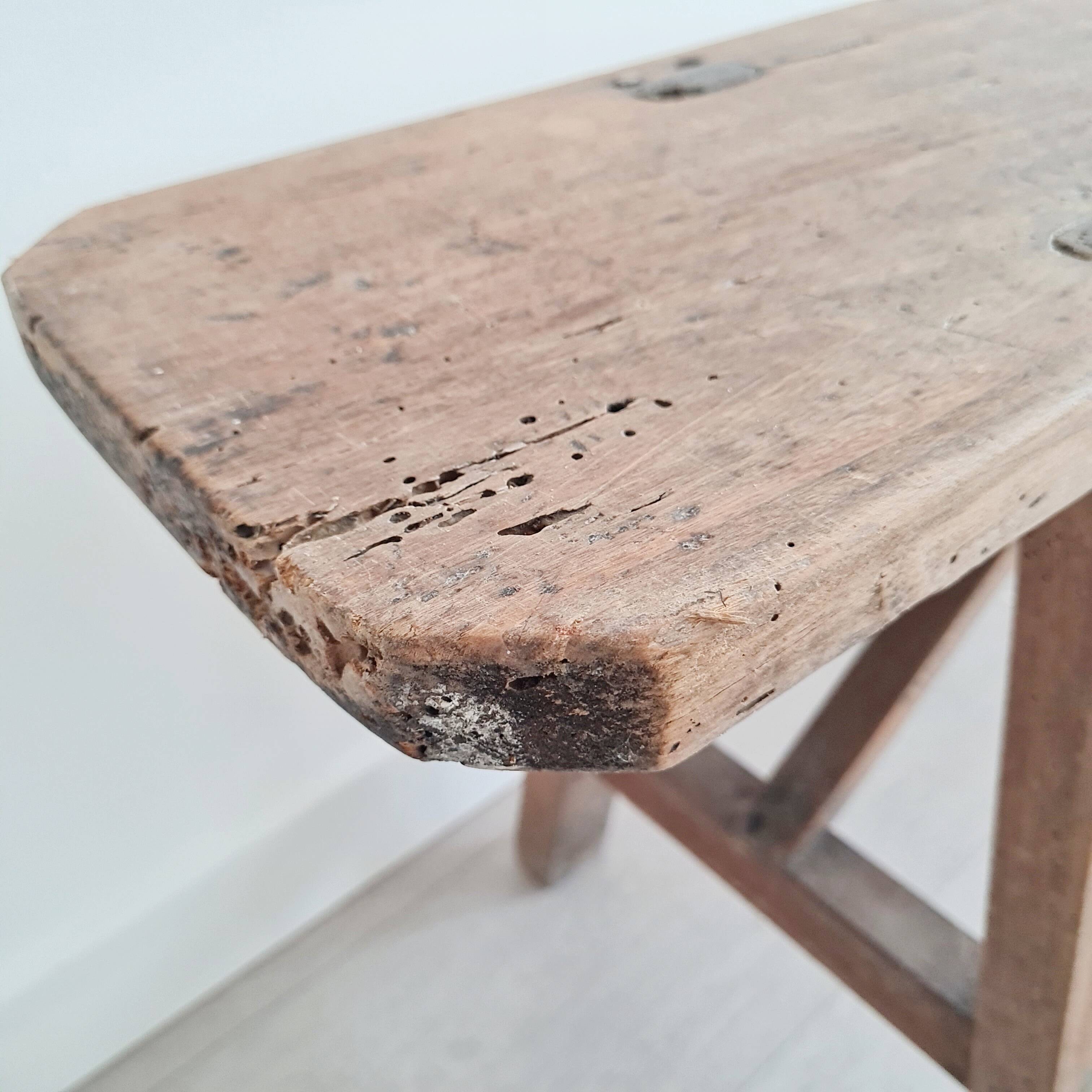 Antique wooden farm bench