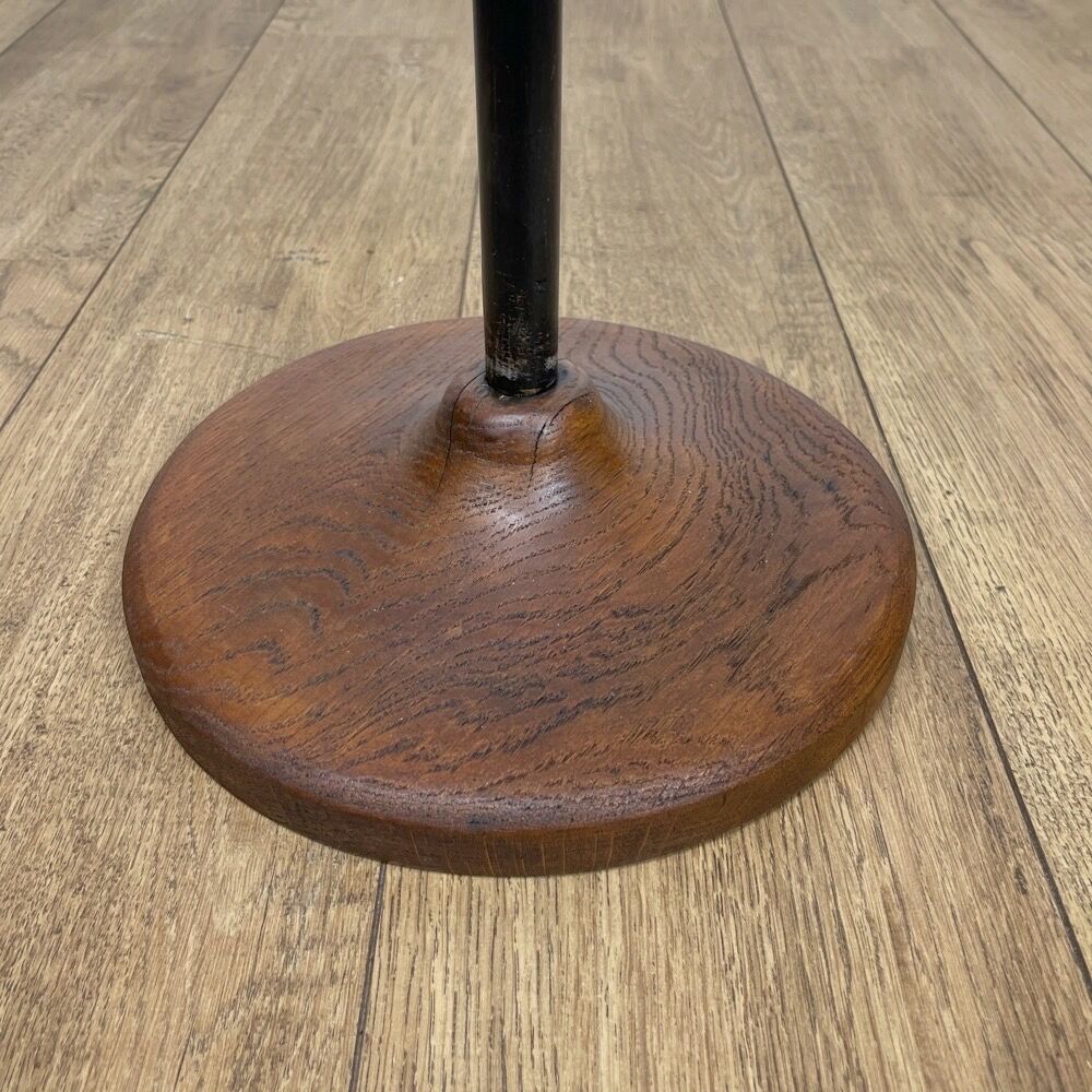 Brass ashtray on metal stand and wooden base
