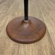 Brass ashtray on metal stand and wooden base