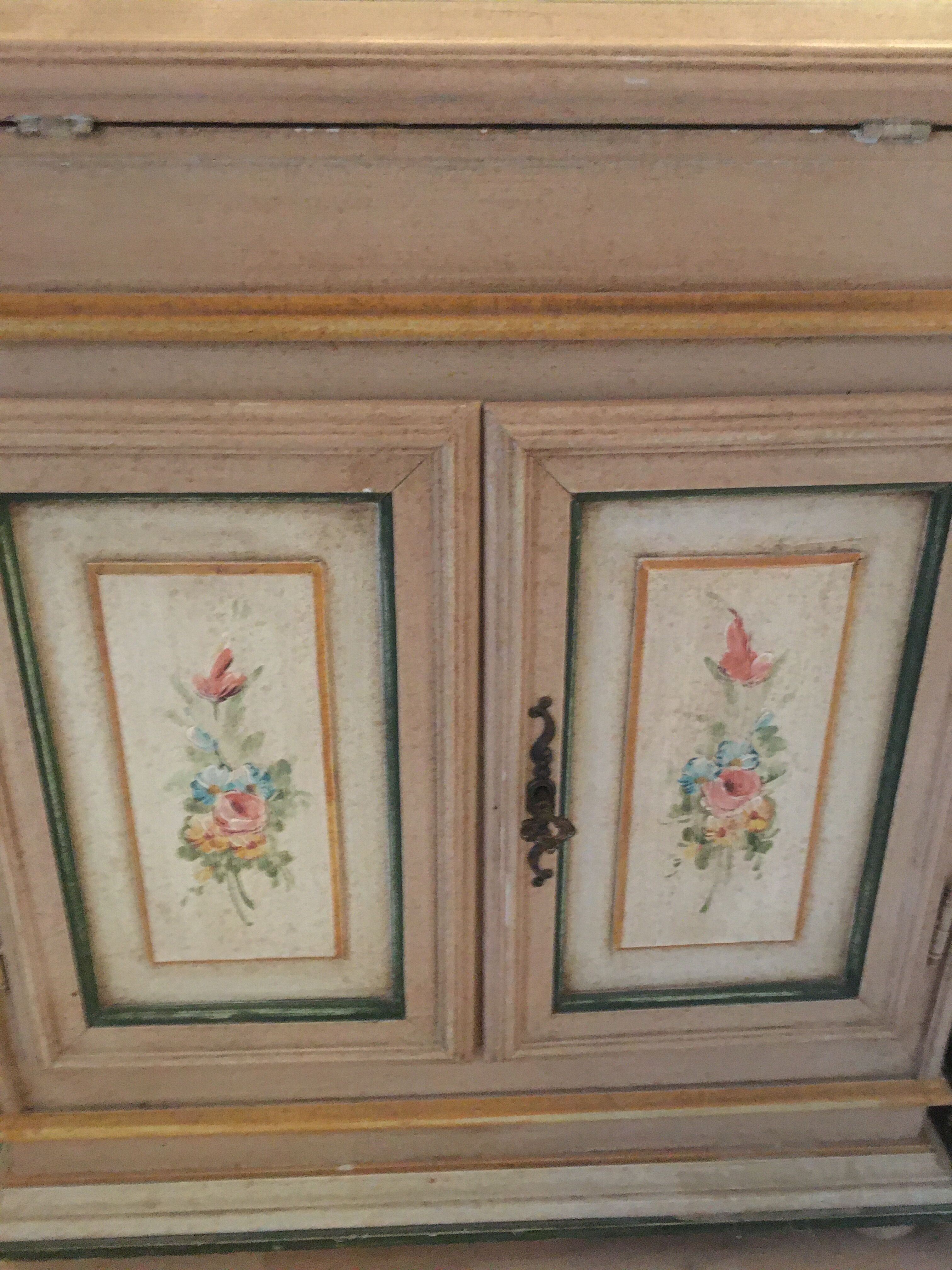 Secretary in pine, wood painted with floral patterns.