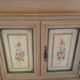 Secretary in pine, wood painted with floral patterns.