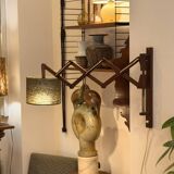 Scandinavian wall lamp in teak, 1960s, with accordion arm.