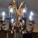 Set of painted metal chandeliers with flower decor