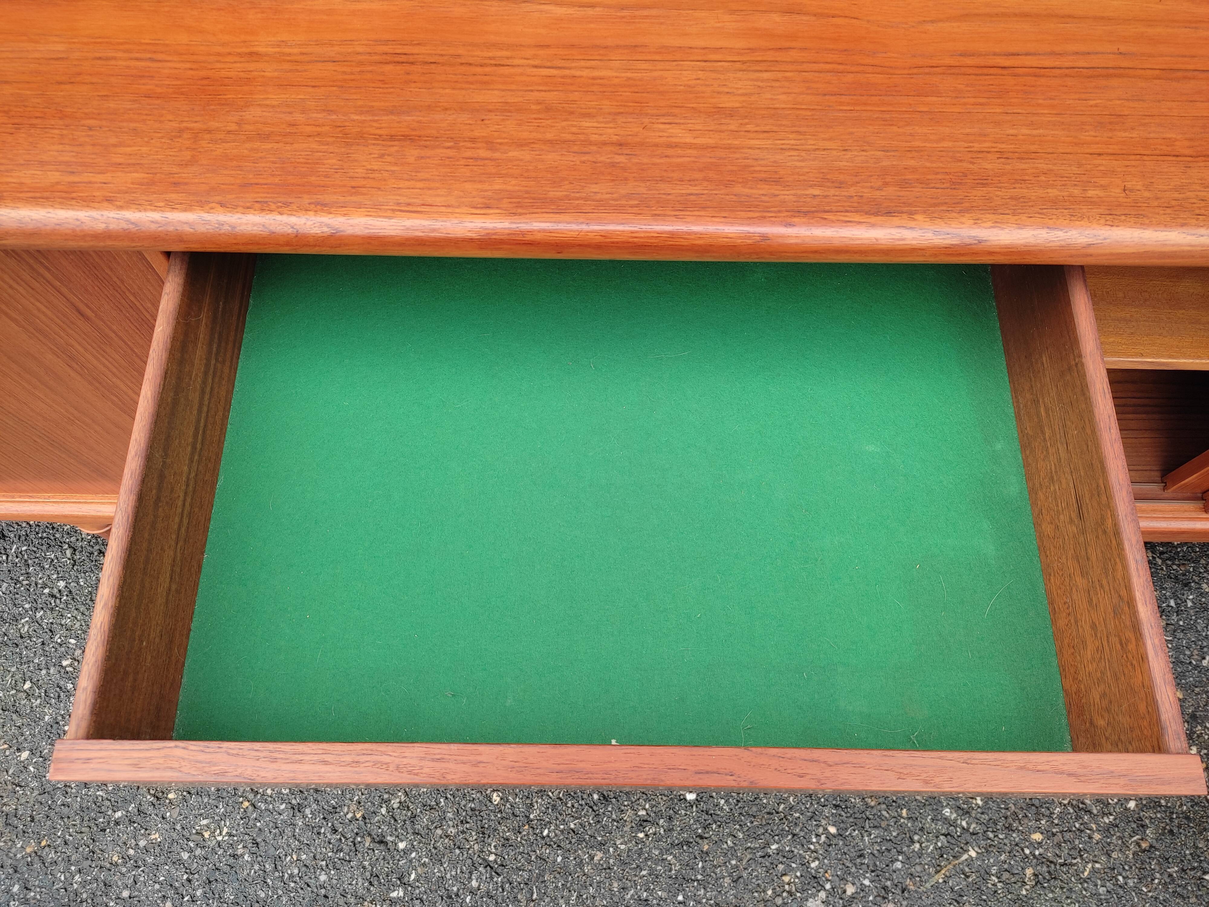 Scandinavian teak row by Axel Christensen for ACO Mobler