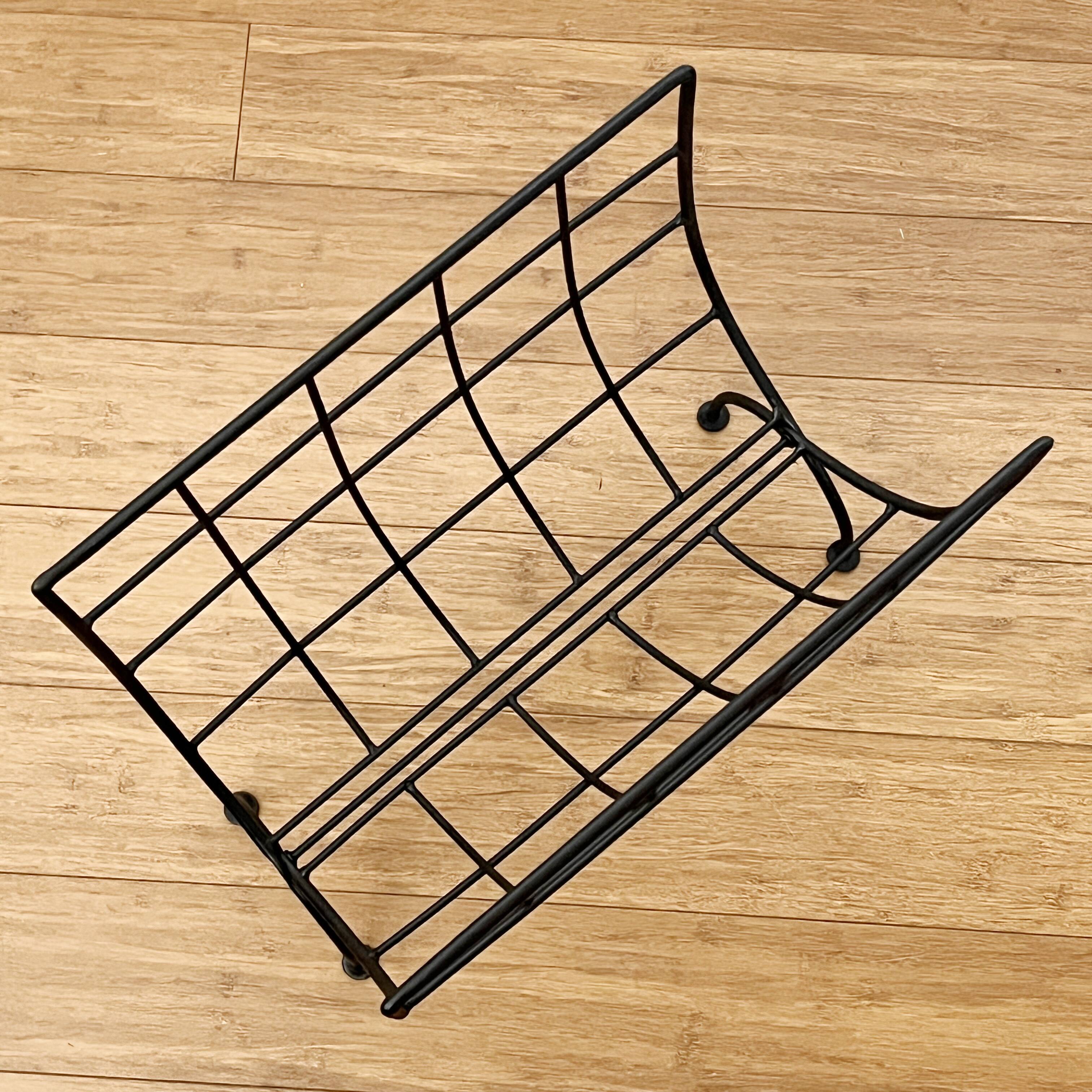 Black metal magazine rack