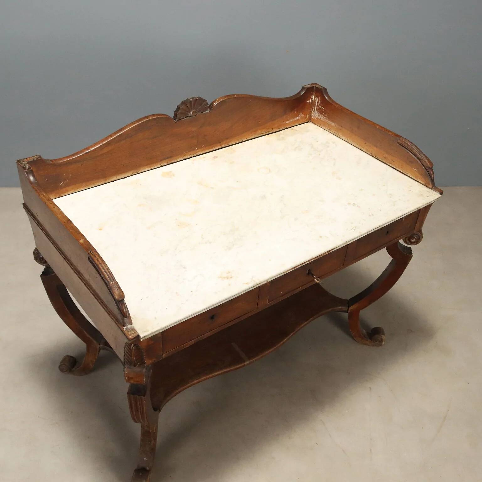 Ancient Empire desk in walnut with marble top, Italy, 19th century.