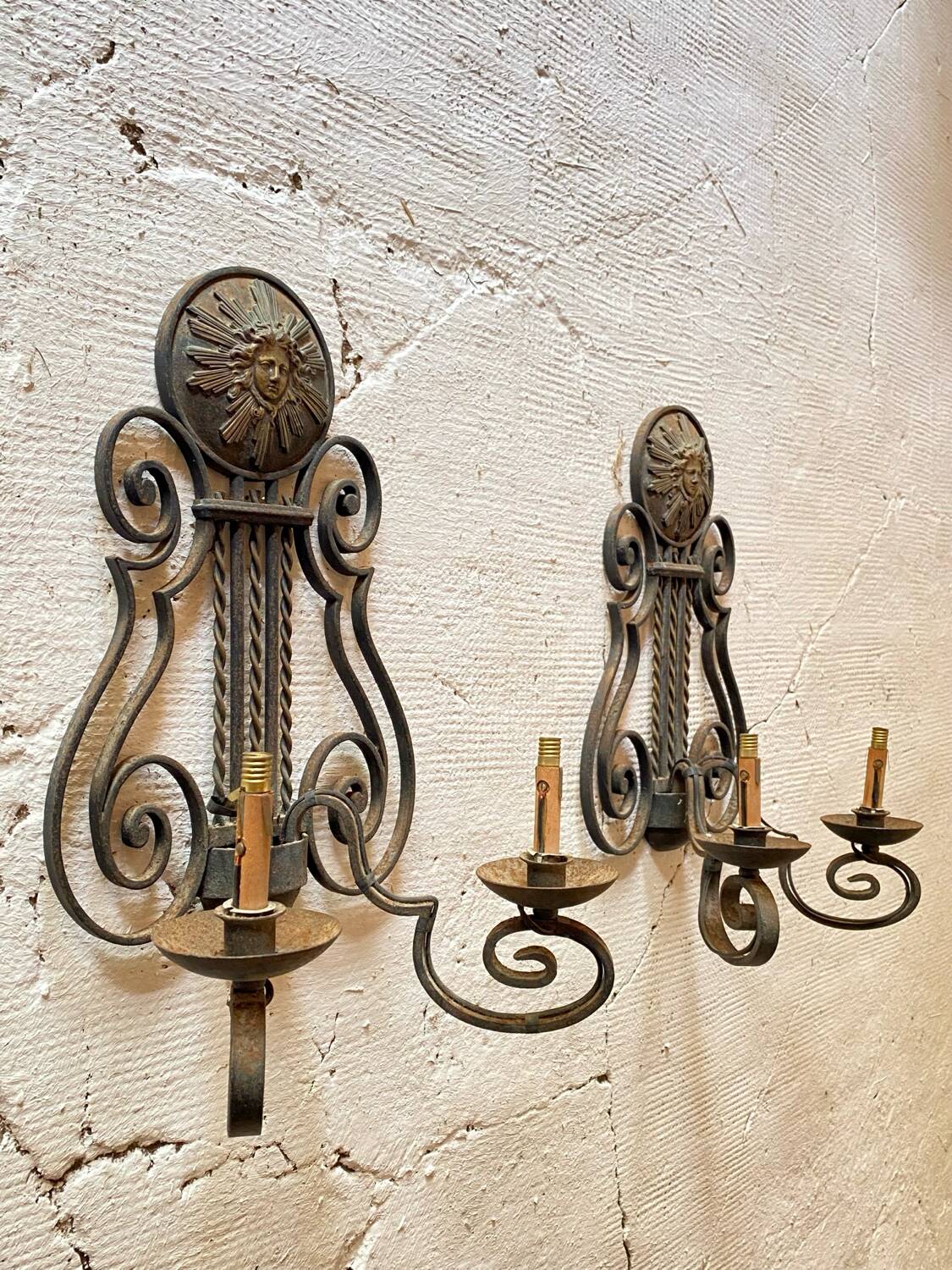 Pair of neoclassical wrought iron wall lights