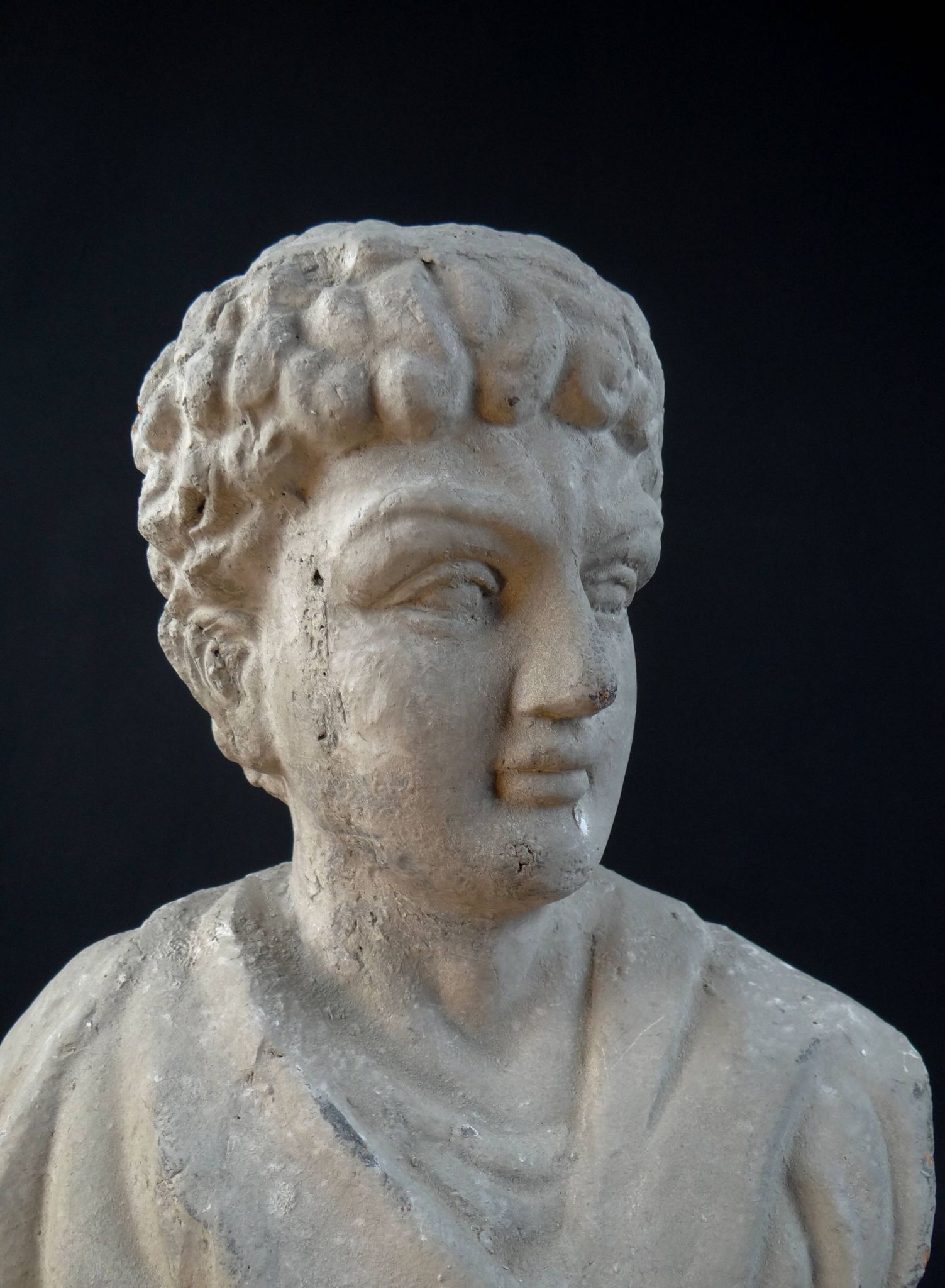Bust of Marcus Aurelius Caesar as a teenager, in terracotta with a grey patina, 20th century