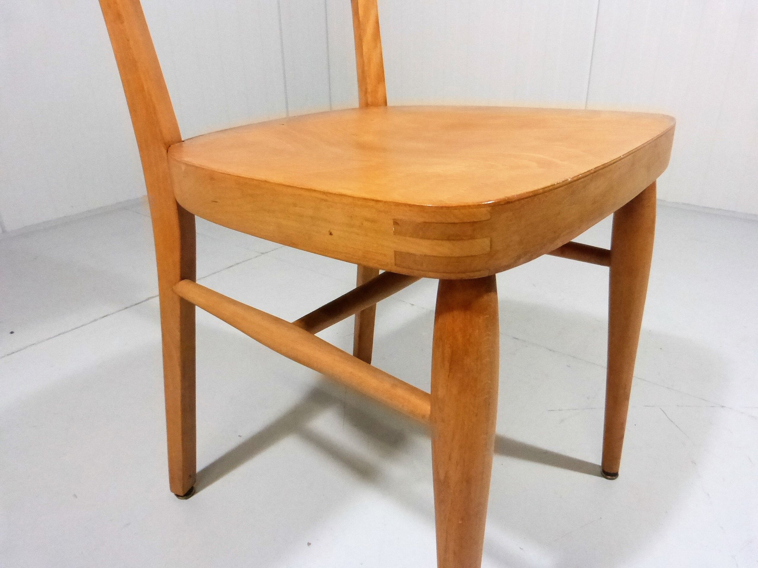 Set of 8 wooden dining chairs 1950’s