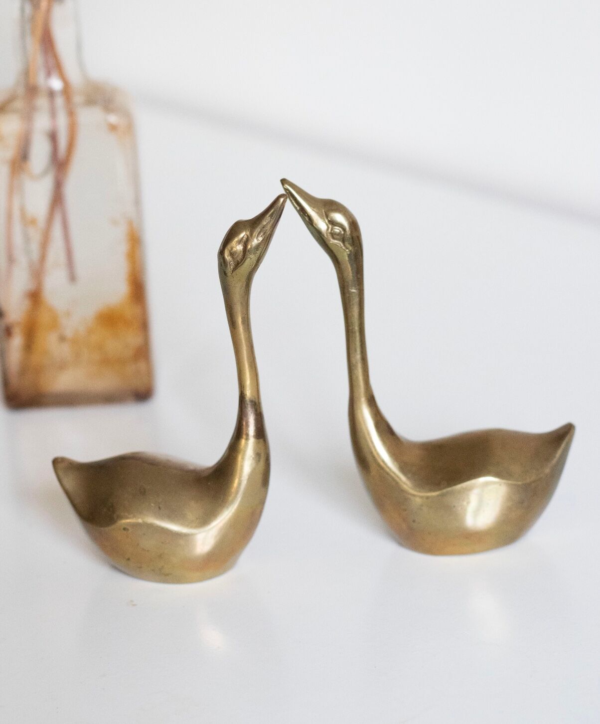 Pair of vintage brass swans