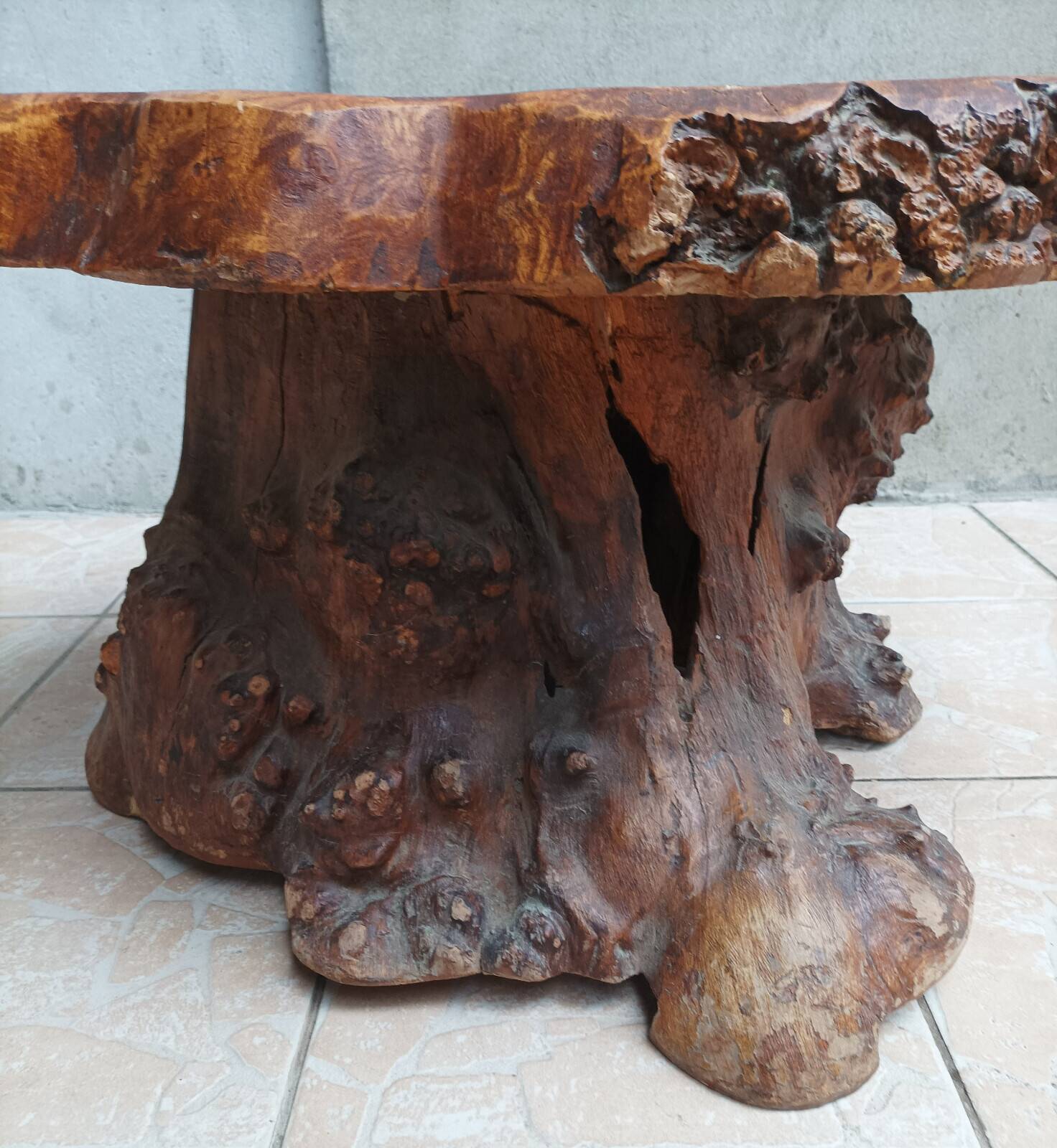 Brutalist chessboard coffee table made from tree stump.