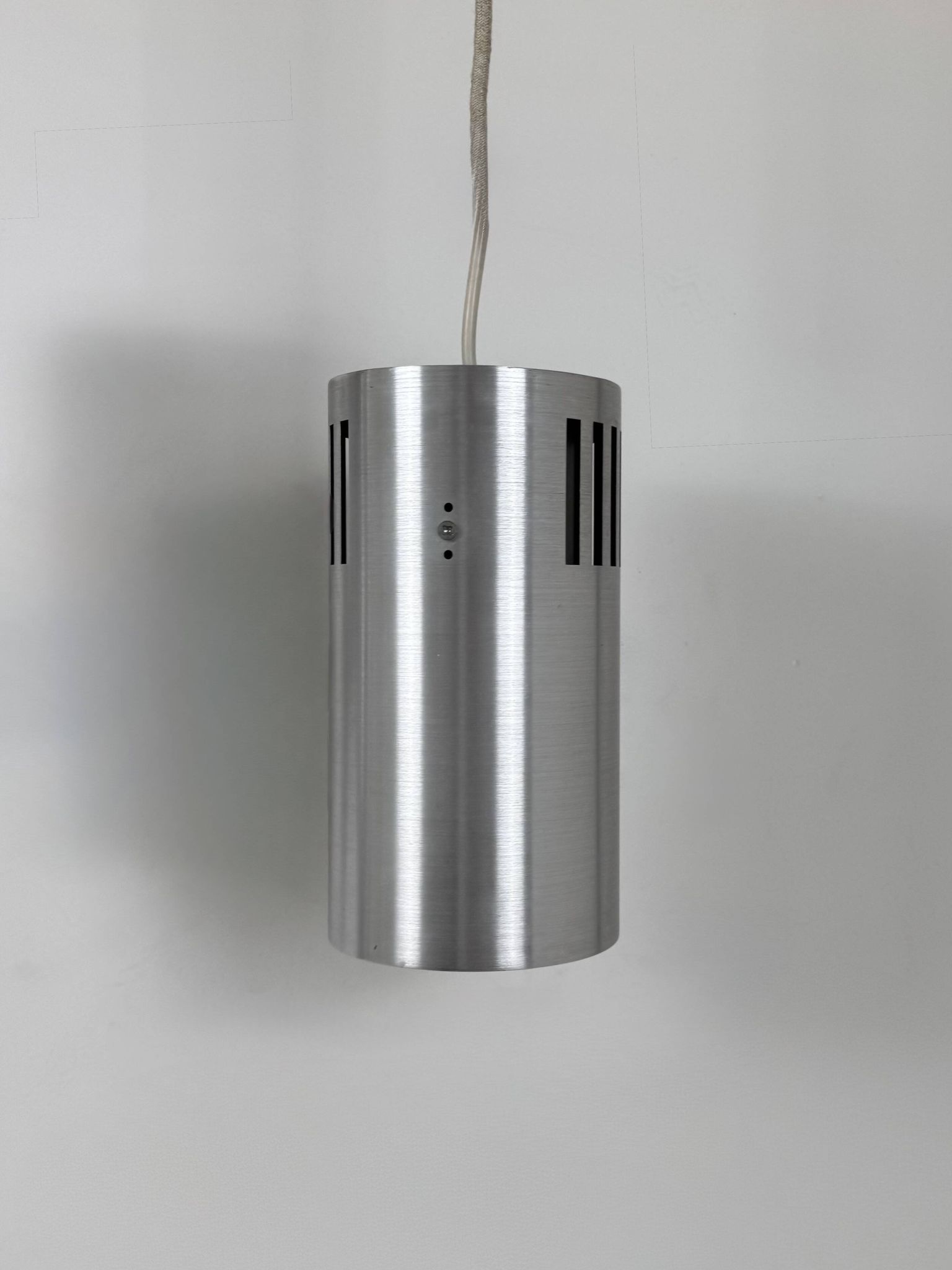 Set of 3 vintage brushed metal pendants, France, 1970.