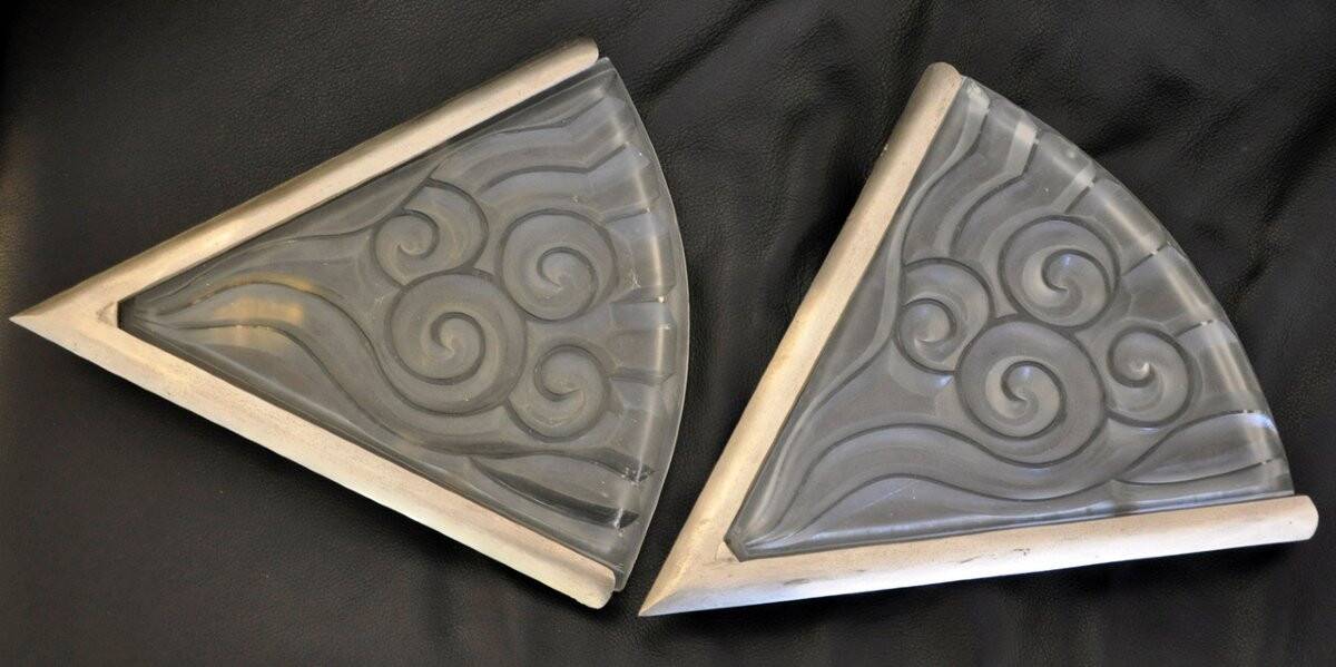 Pair of angular art deco wall sconces with silver metal frames