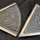 Pair of angular art deco wall sconces with silver metal frames