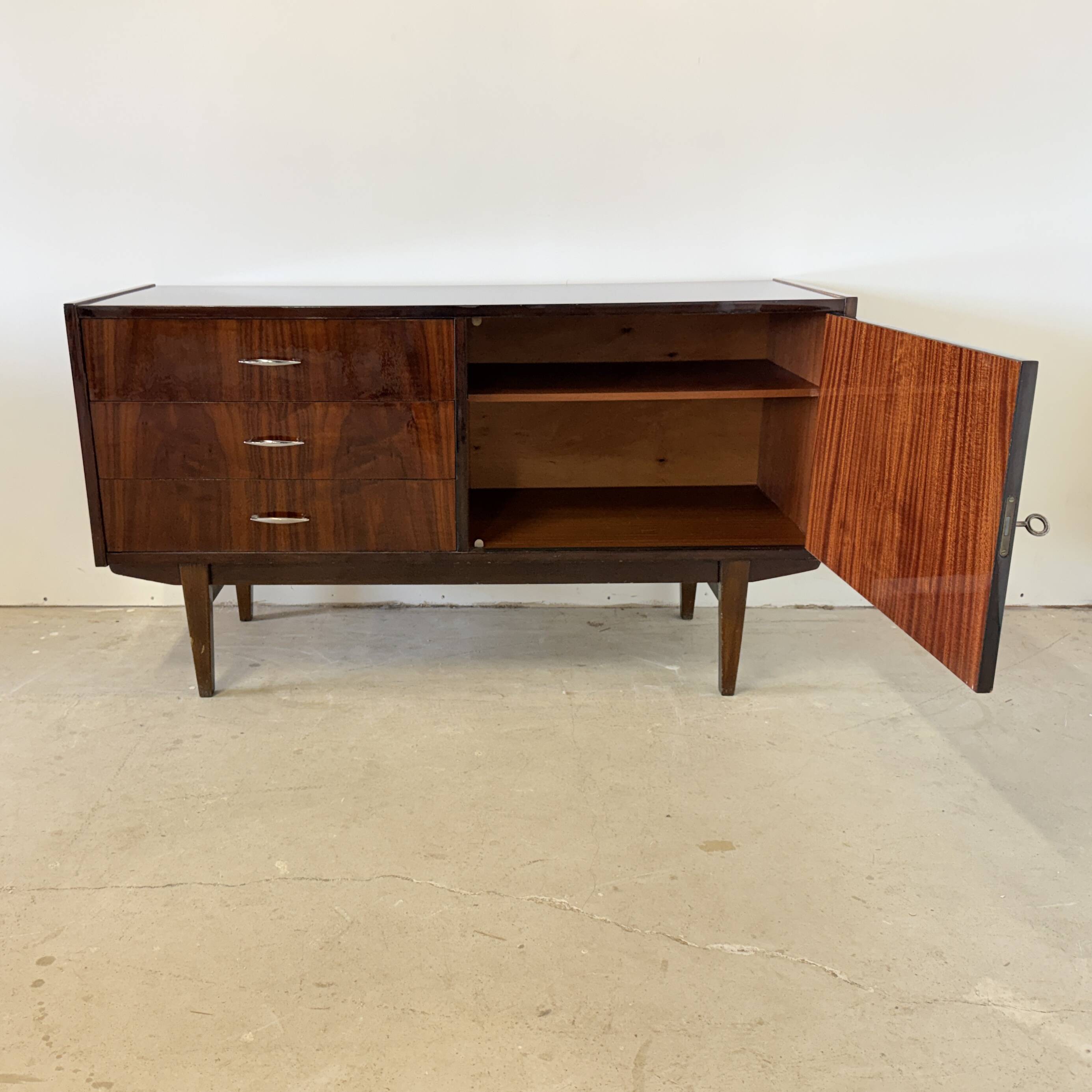 Subtle high-gloss sideboard in Scandinavian style