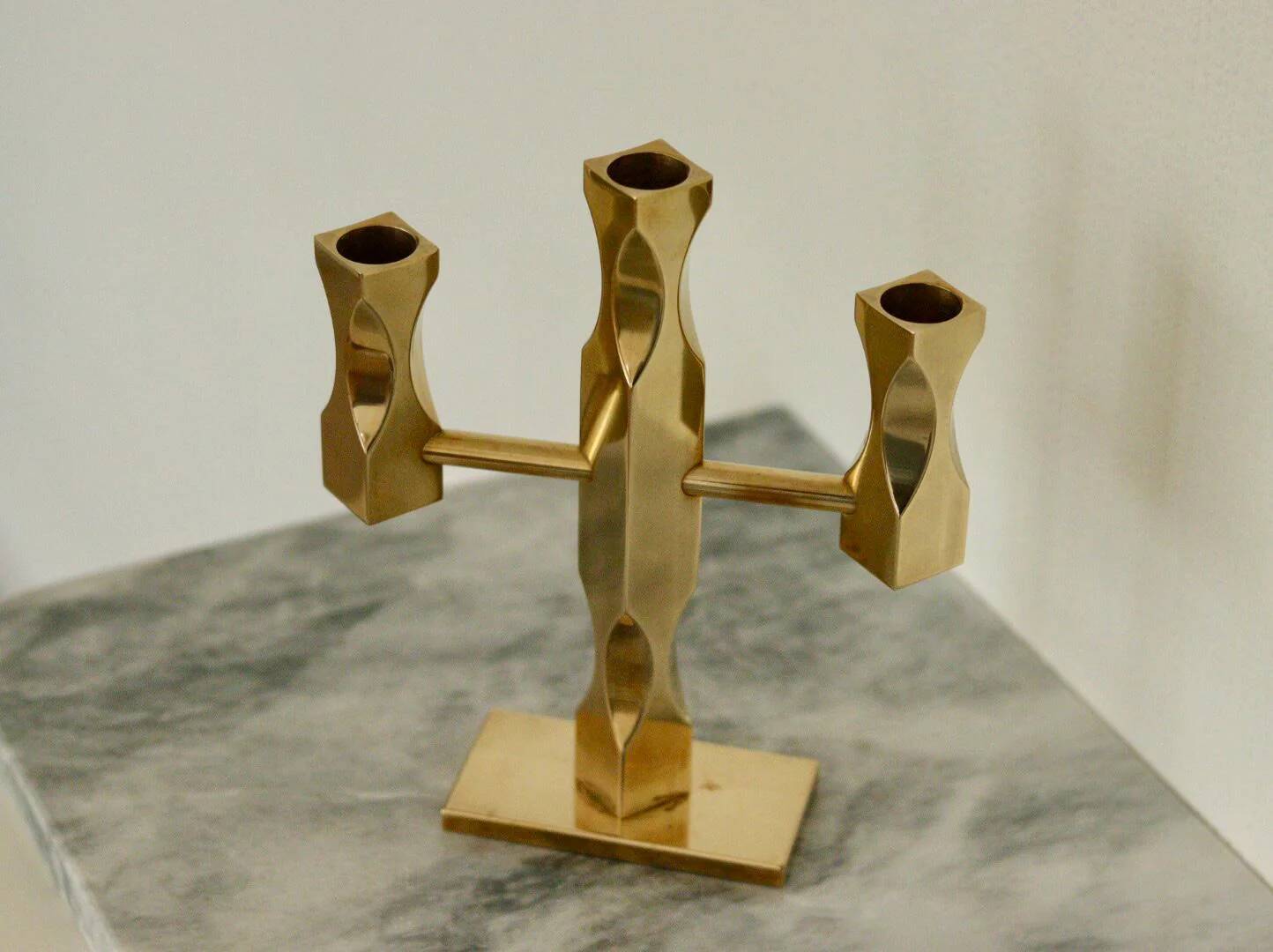 Swedish three-armed candelabrum in brass by Lars Åkesson for Vallonmässing