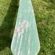 Old curved wooden farm bench