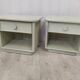 Pair of wooden and wicker bedside tables