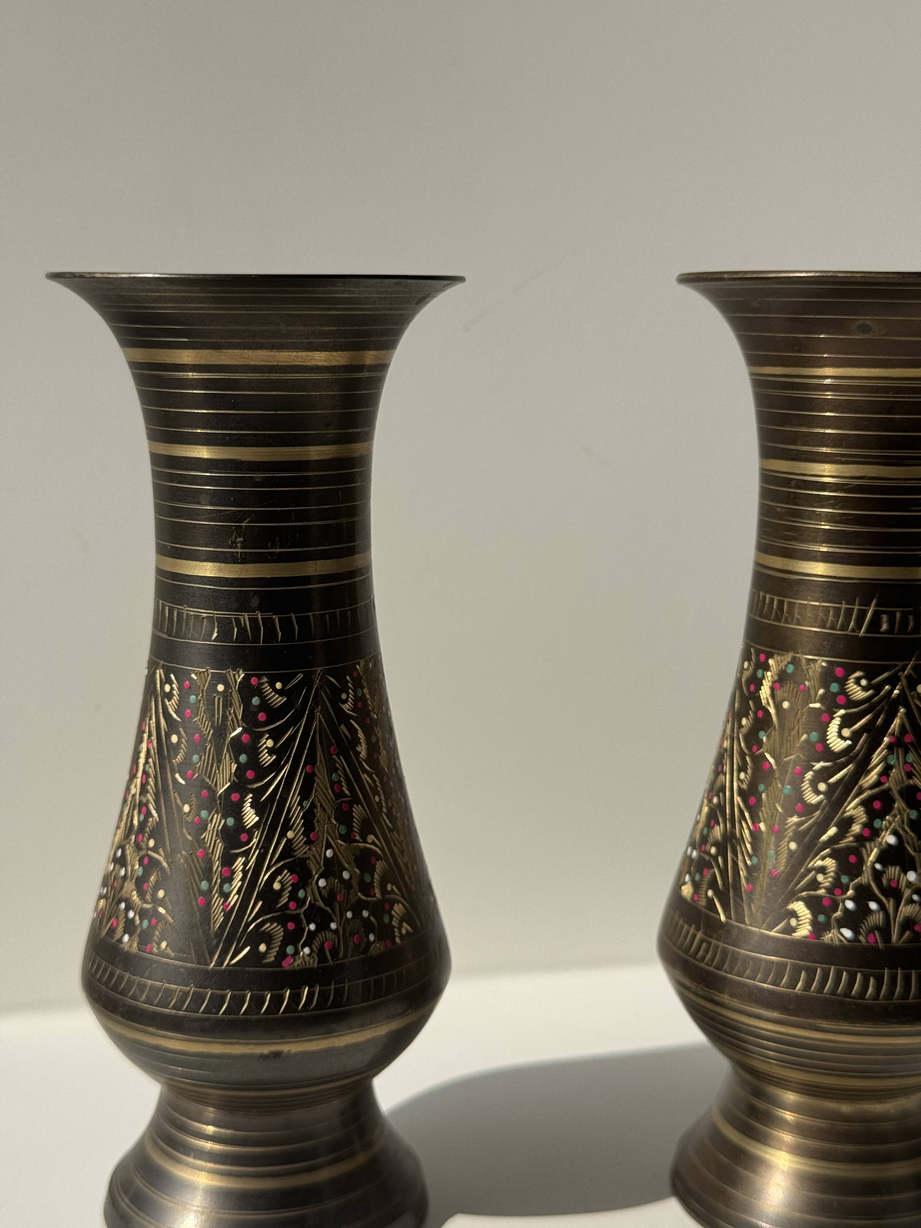 Pair of two small chiseled metal vases H15.5 D6.5