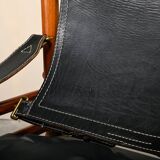 Fauteuil lounge Sirocco Safari d'Arne Norell en palissandre et cuir noir, Suède