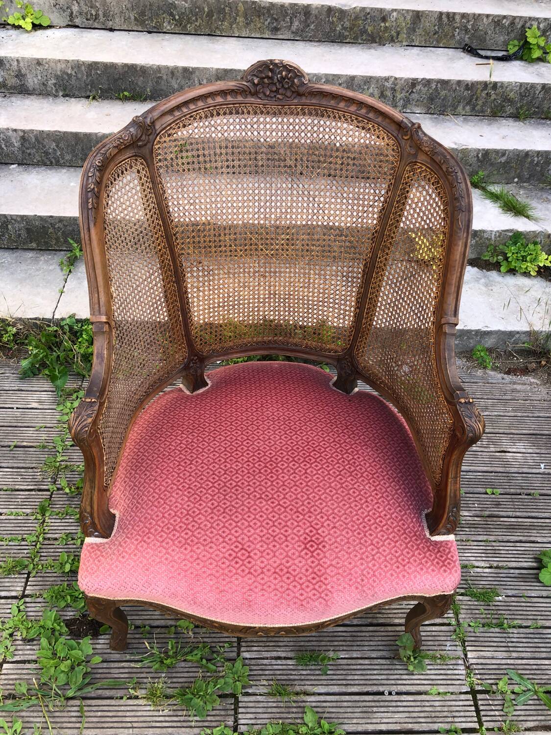 Louis XV style walnut and cane armchair