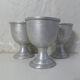 3 old aluminum shells