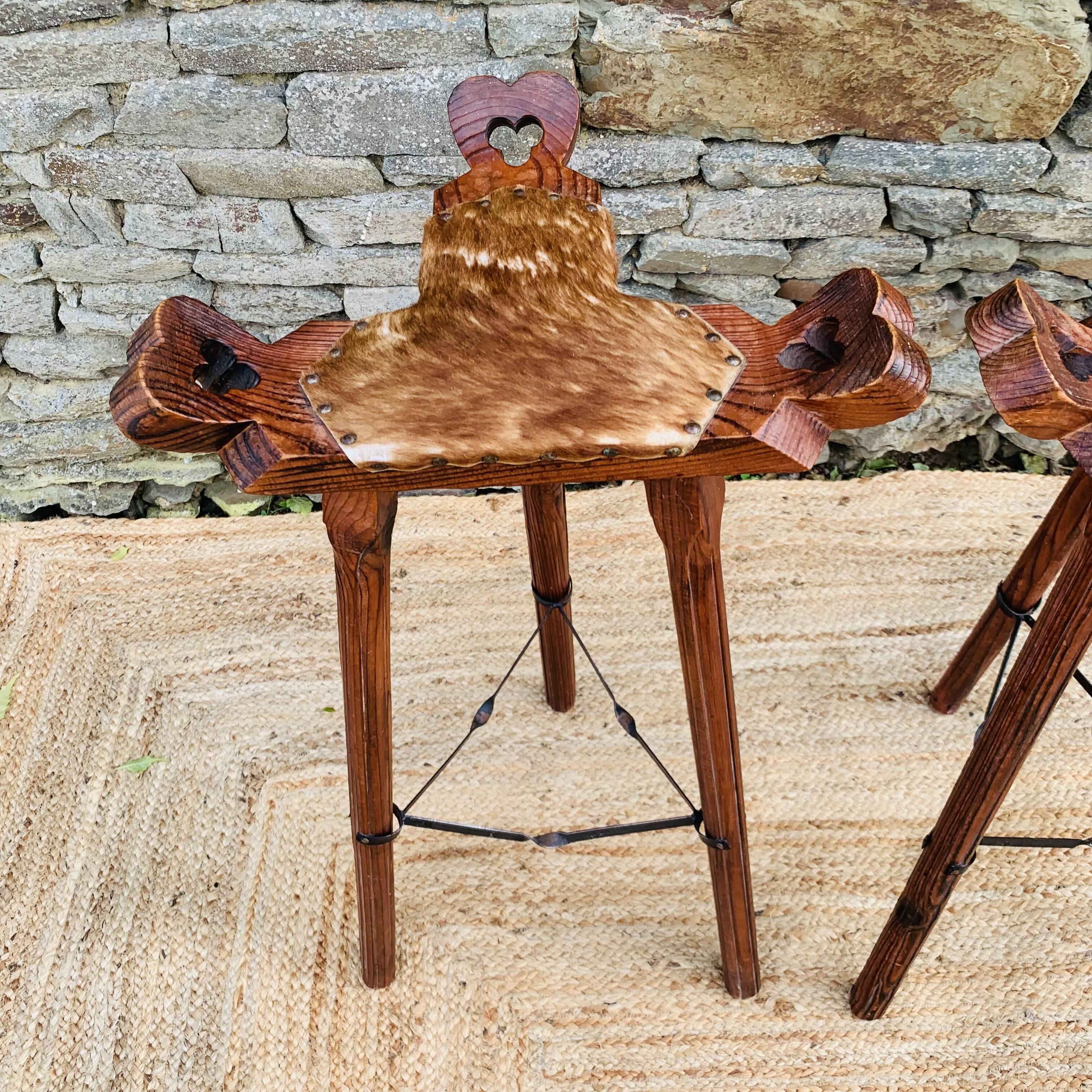 Set of 2 vintage high stools in cowhide and wood