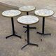 Round bistro table with a central pedestal, gold marble effect and black steel, 60cm.