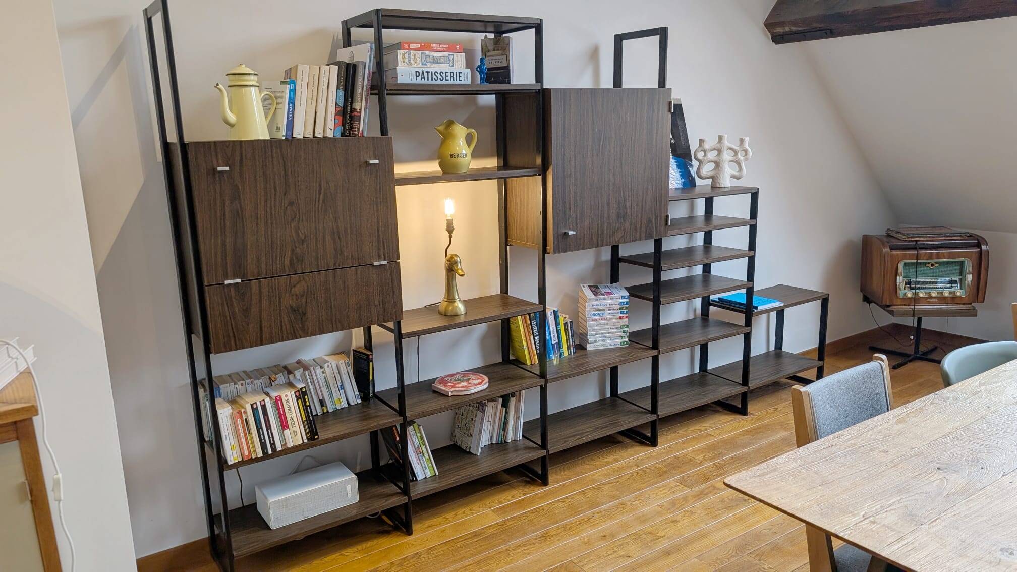 Modular rosewood bookcase by Pierre Guariche for Meurop