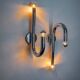 Pair of space-age tubular wall lights, chromed metal, Italy, 1970