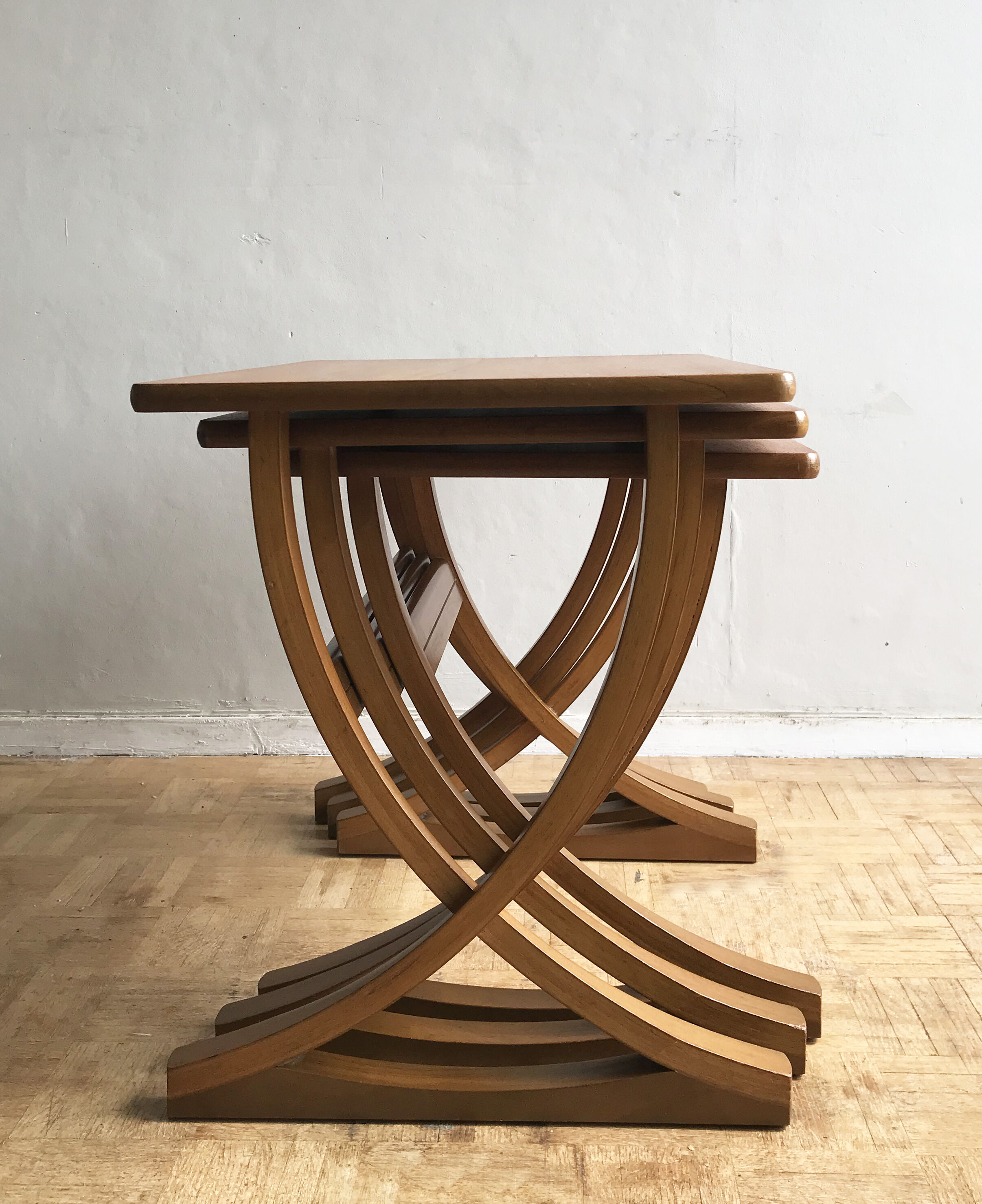 Set of 3 nesting tables from Nathan editions in teak and beech.
