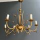 Golden Metal Chandelier with Reed Bouquet Decoration. Coco Chanel Style. Work