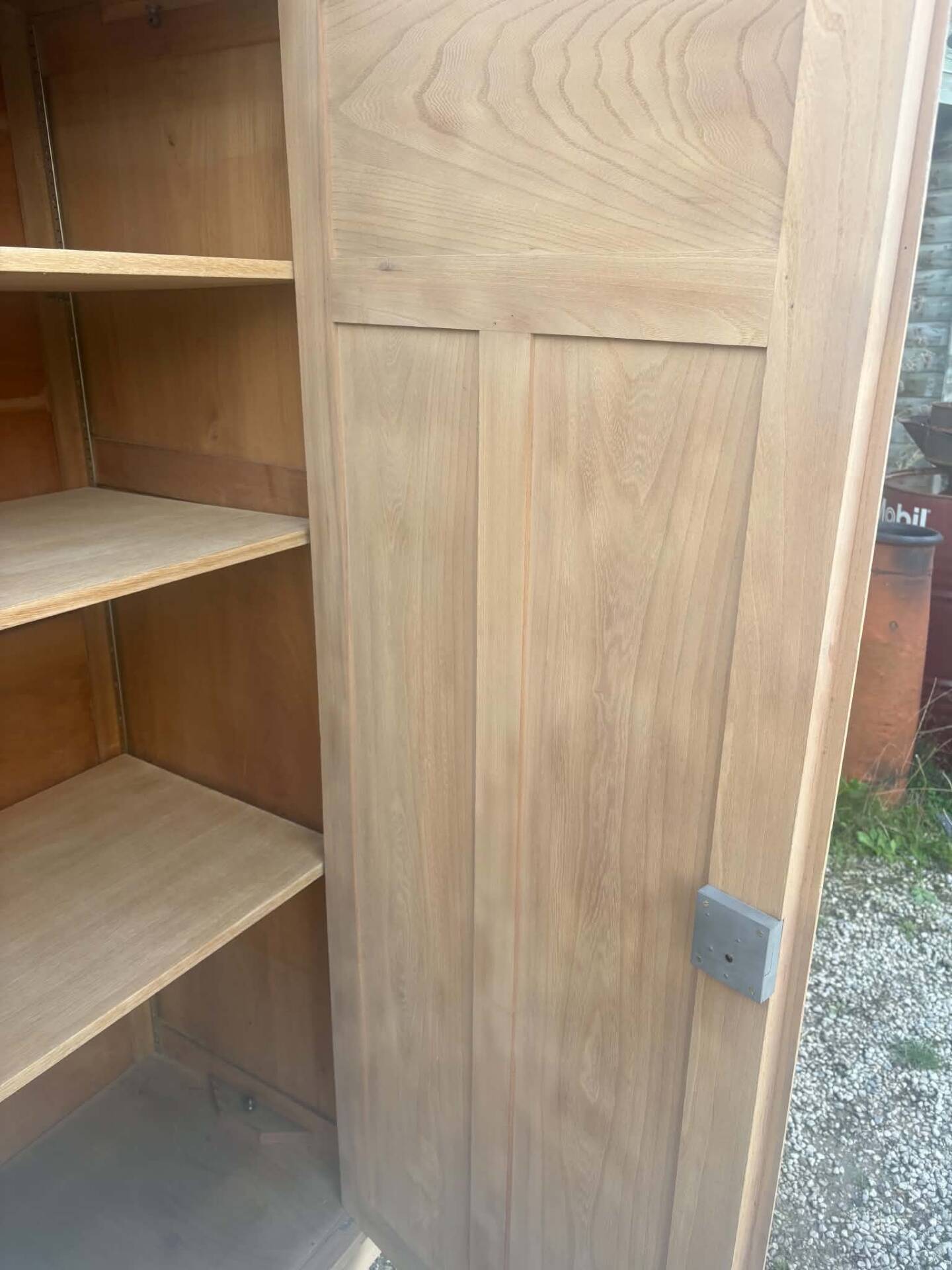 Large antique wardrobe in raw wood