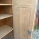 Large antique wardrobe in raw wood