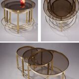 Set of three nesting coffee tables in bronze and smoked glass, 70s