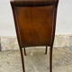 Brown leather tufted Chesterfield chair