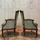 Paire de fauteuils bergères de style Louis XVI