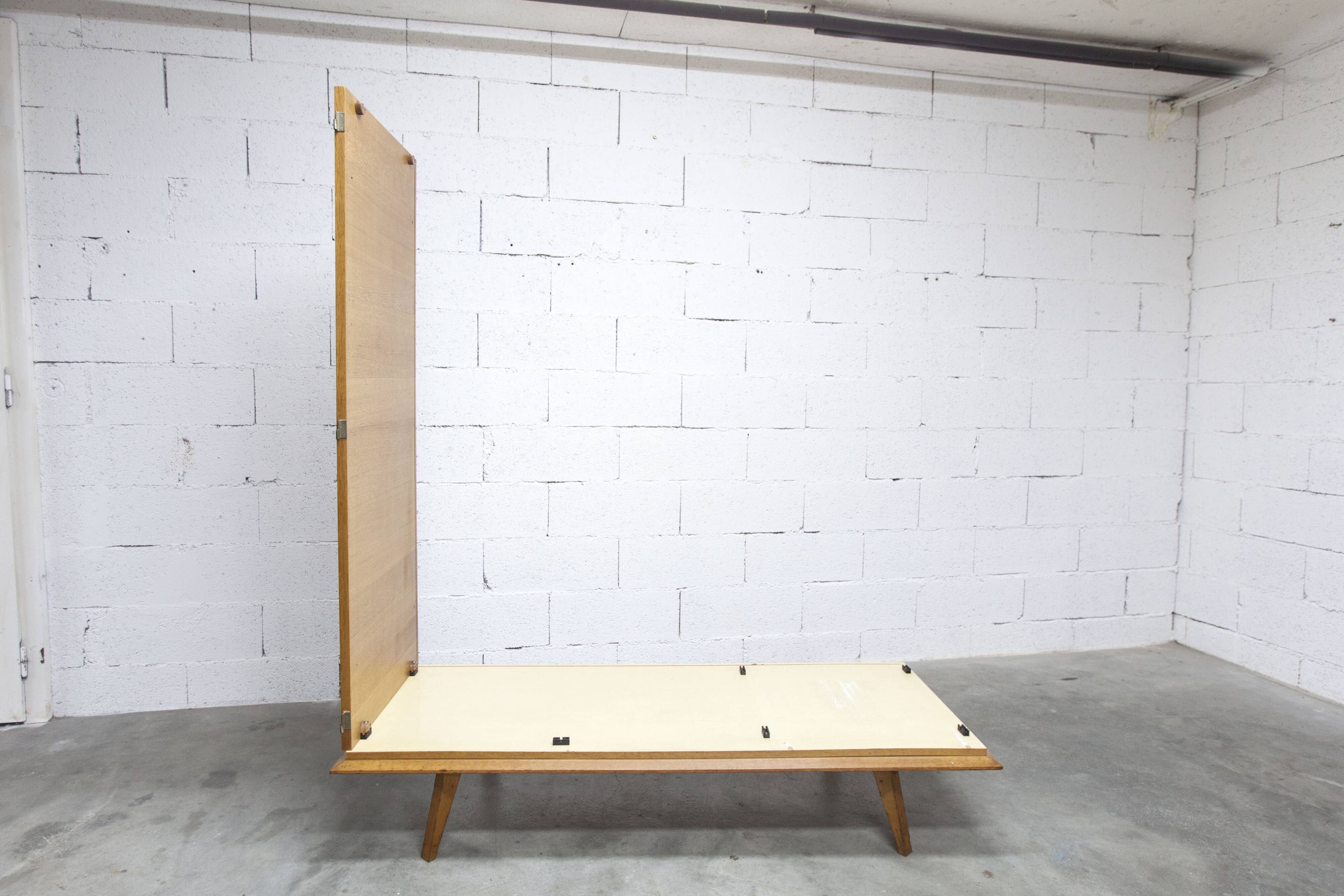 French wardrobe with tapered legs, 3 doors, 1 mirror (27*130), and 1 drawer.