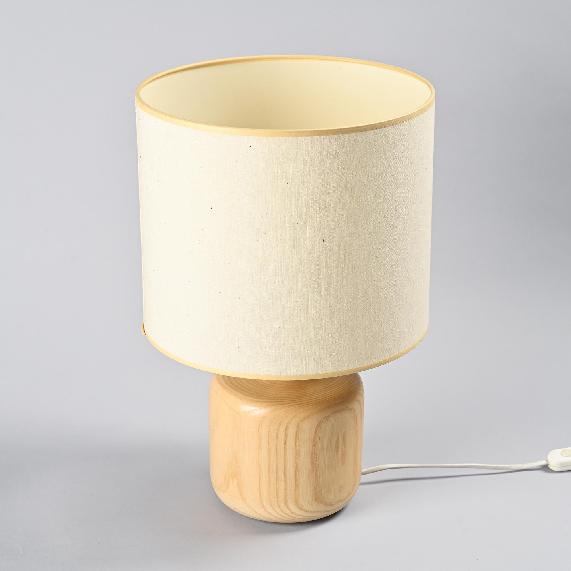 Table lamp in solid elm, France, circa 1970.