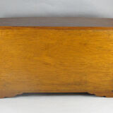 Wooden jewelry box in the shape of a chest of drawers