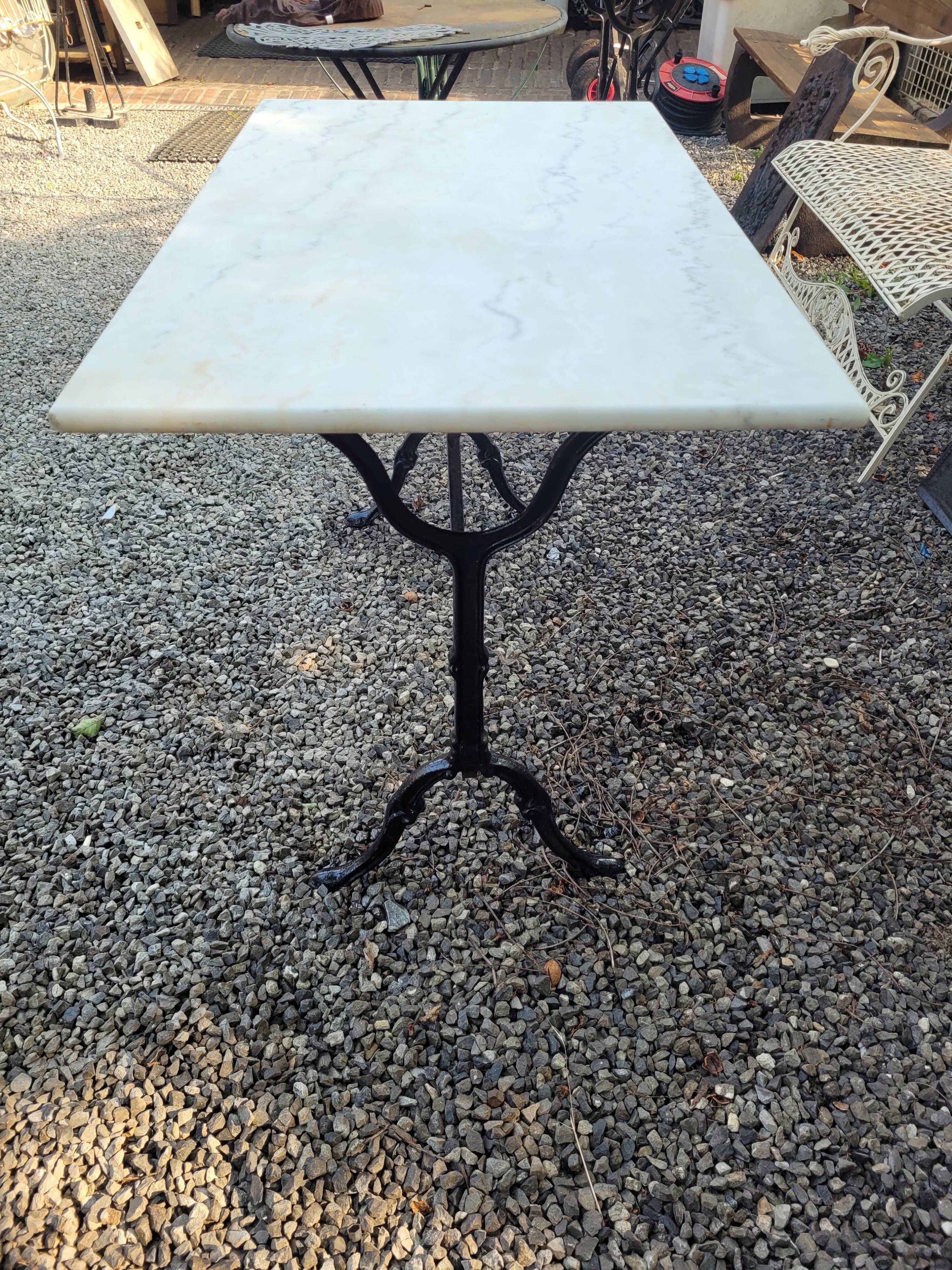 Bistro table top marble foot cast iron