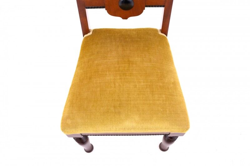 Table with four chairs from the early 20th century