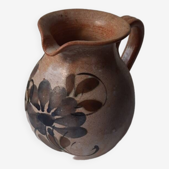 Flowered stoneware pitcher