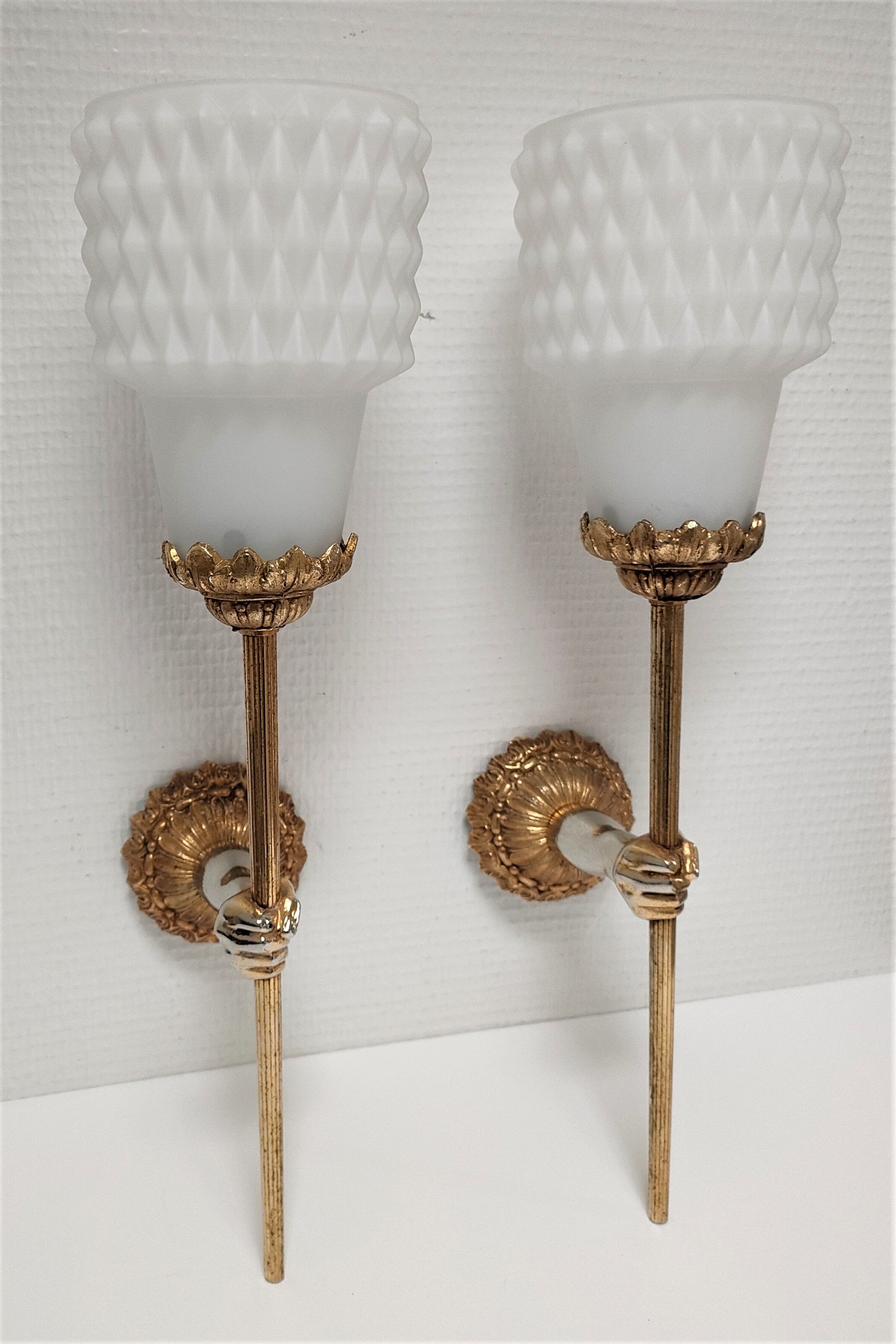 Pair of vintage patinated golden metal hand sconces