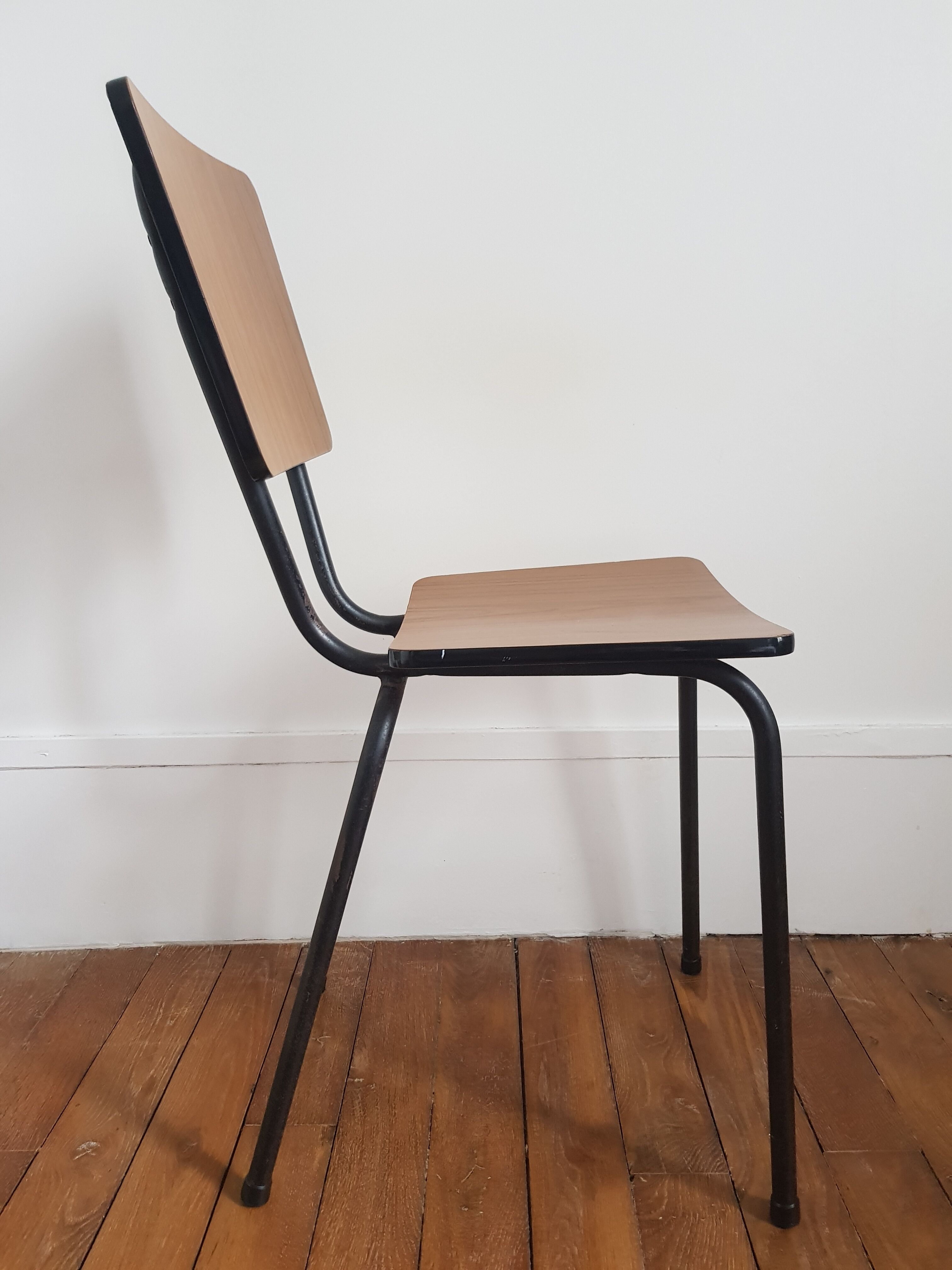 Brown formica chair with black structure