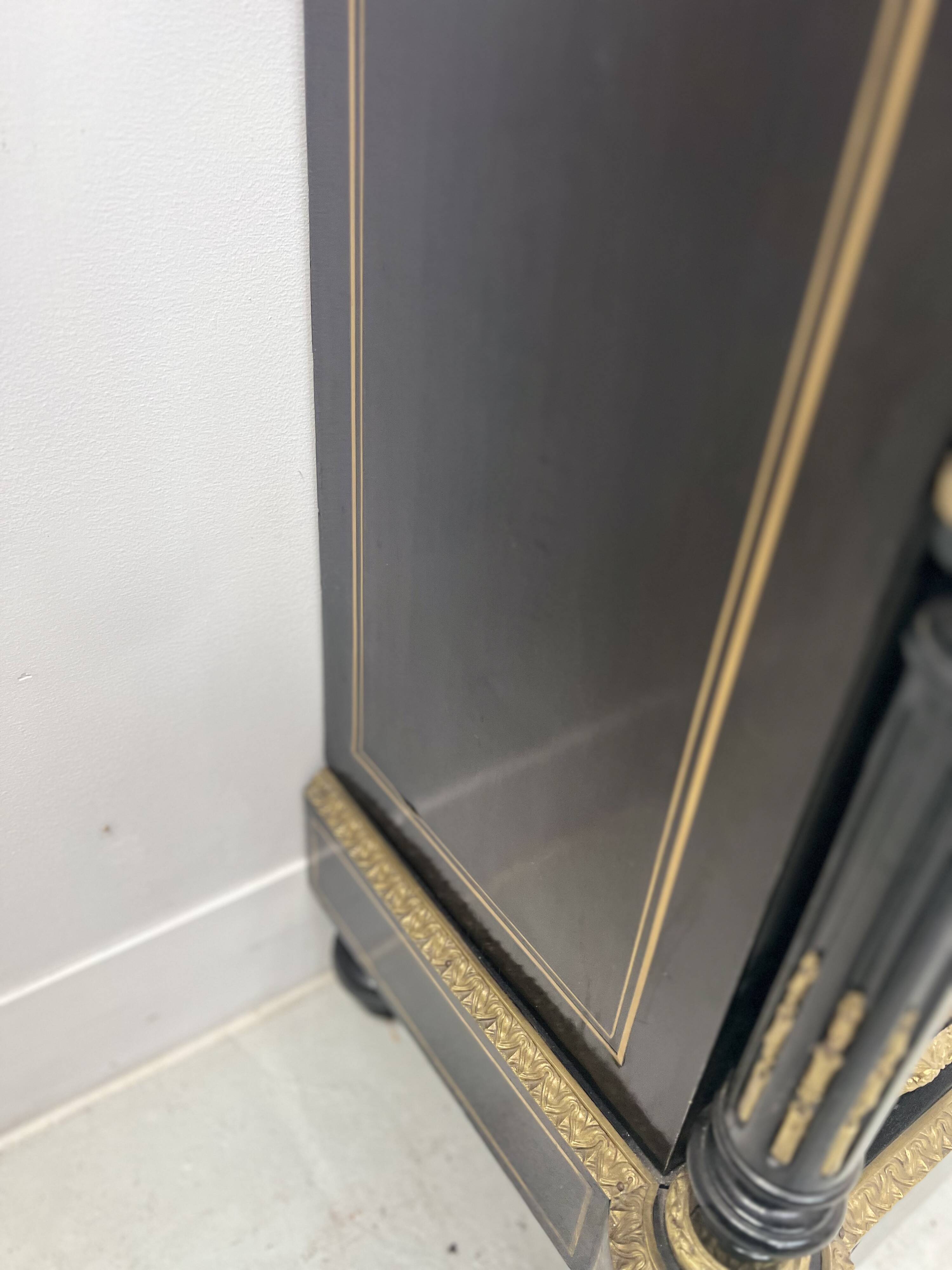 Napoleon III furniture has a black wooden door and brass marquetry 19th century